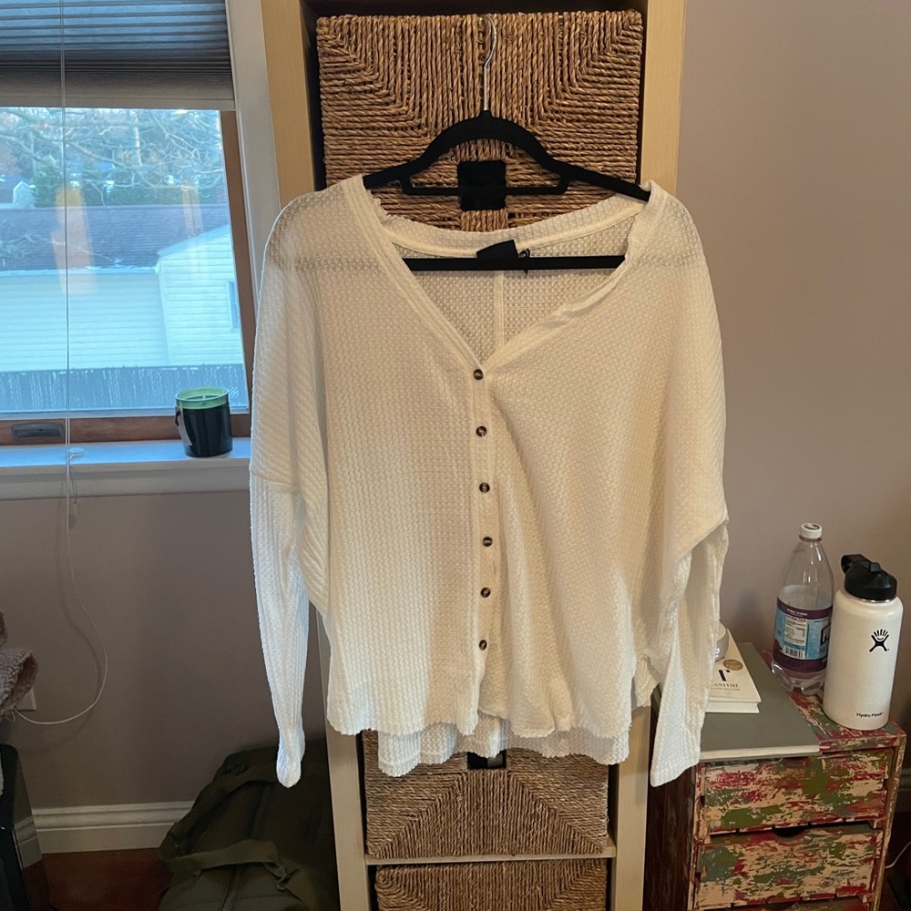 Out from under cardigan